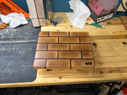 Maple end grain cutting board with walnut brick pattern, overhead view